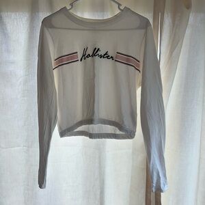 Size medium, color white, long sleeve tee from Hollister.